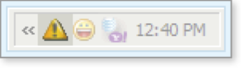 The warning icon in the system tray